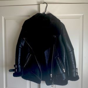 Fur-lined leather jacket